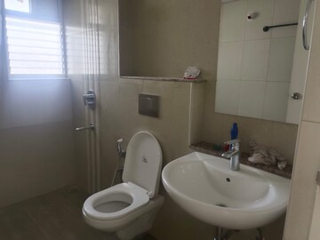 Bathroom in 2 BHK Apartment at Kolte Patil iTowers Exente, Electronic City Phase I – for Rent