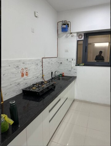 Kitchen in 2 BHK Apartment at Amanora Gold Towers, Hadapsar – for Rent