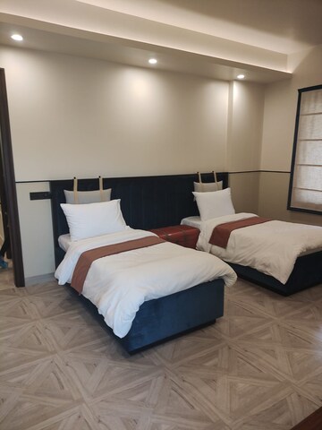 Bedroom in 4 BHK Apartment at Eros Edenwood Towers, Lakkarpur – for Sale