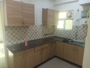 Kitchen in 3 BHK Apartment at Gaur City 2  – for Rent