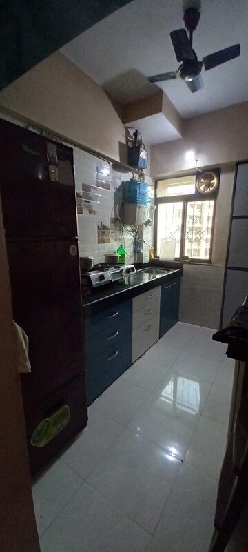 Kitchen in 1 BHK Apartment at Krishna Greenland Park Vastu Federation, Ghodbunder Road – for Rent