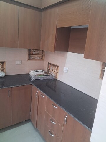 Kitchen in 2 BHK Apartment at Aims Golf Green, Tech Zone 4 Greater Noida – for Sale