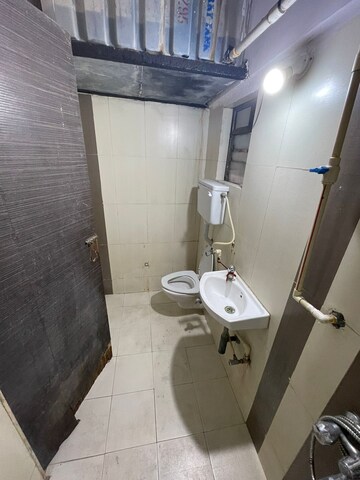Bathroom in 3 BHK Apartment at Gaurav Woods Phase I, Mira Road – for Sale