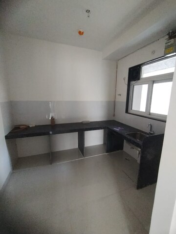 Kitchen in 2 BHK Apartment at Ashar Axis, Majiwada – for Rent