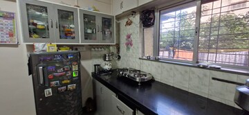 Kitchen in 2.5 BHK Apartment at Karve Nagar – for Rent
