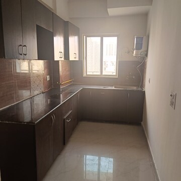 Kitchen in 3 BHK Apartment at Amrapali Silicon City, Sector 76 – for Rent