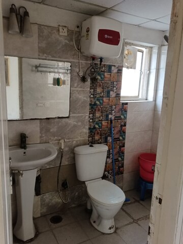 Bathroom in 3 BHK Apartment at Amrapali Silicon City, Sector 76 – for Rent