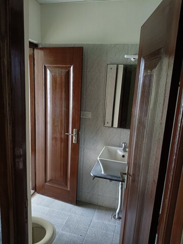 Bathroom in 3 BHK Apartment at Sushma Infinium, Ghazipur – for Rent