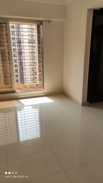 Master Bedroom in 1 BHK Apartment at Rutu Enclave, Kasarvadavali – for Rent