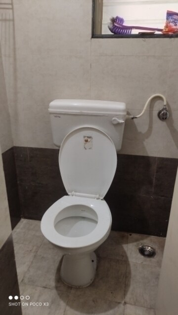 Bathroom in 1 BHK Apartment at Rutu Enclave, Kasarvadavali – for Rent