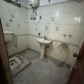 Bathroom in 2 BHK Builder Floor at South Extension I – for Rent