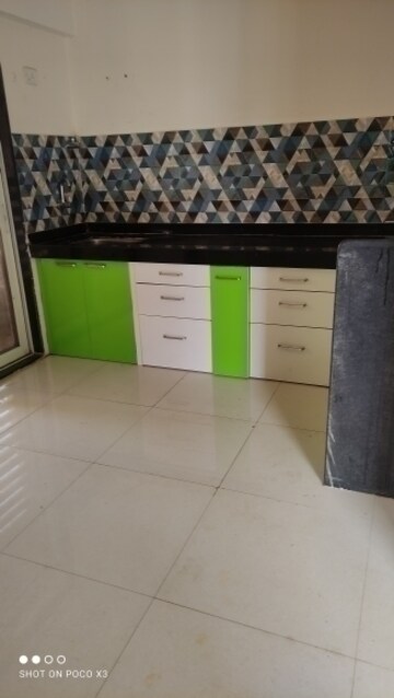 Kitchen in 1 BHK Apartment at Rutu Enclave, Kasarvadavali – for Rent