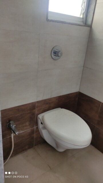 Bathroom in 1 BHK Apartment at Rutu Enclave, Kasarvadavali – for Rent