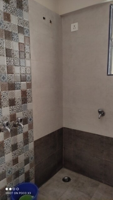 Bathroom in 1 BHK Apartment at Rutu Enclave, Kasarvadavali – for Rent
