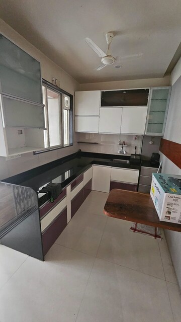 Kitchen in 3 BHK Apartment at Citadel Jai Rajkiran CHS, Walvekar Nagar – for Sale