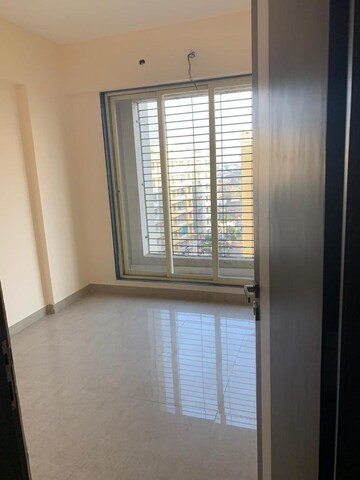 Room in 2 BHK Apartment at Mohan Willows, Badlapur East – for Sale