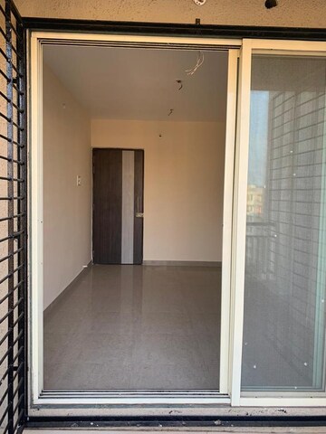 Room in 2 BHK Apartment at Mohan Willows, Badlapur East – for Sale