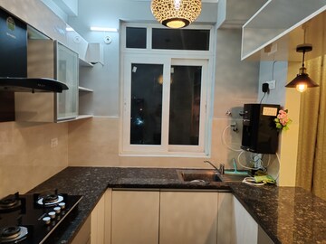 Kitchen in 2 BHK Apartment at Chandra Panorama, Sushant Golf City – for Rent
