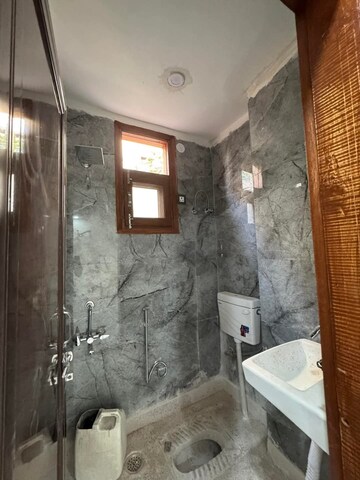 Bathroom in 1 BHK Apartment at Freedom Fighters Enclave – for Rent