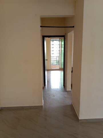 Building Lobby in 2 BHK Apartment at Kalp Nisarg Phase I, Shirgaon – for Rent