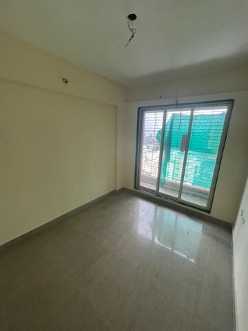 Master Bedroom in 1 BHK Apartment at Mohan Willows, Badlapur East – for Rent