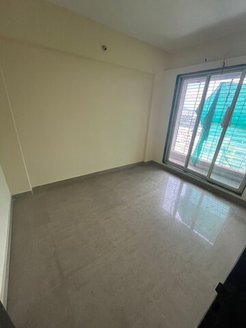Room in 1 BHK Apartment at Mohan Willows, Badlapur East – for Rent