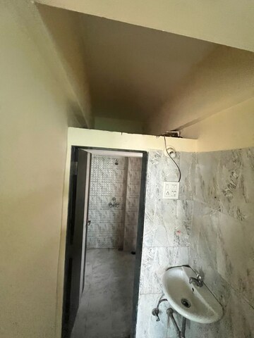 Building Lobby in 1 BHK Apartment at Mohan Willows, Badlapur East – for Rent
