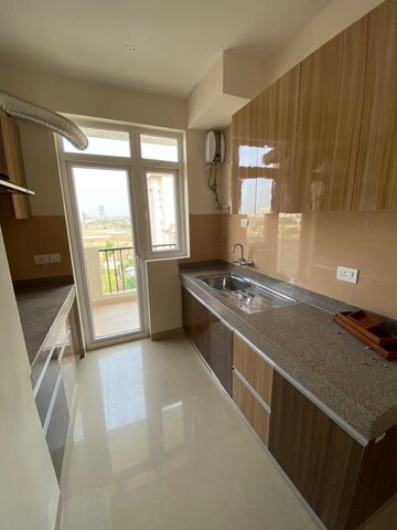 Kitchen in 2 BHK Apartment at Emaar Emerald Estate, Sector 65 – for Rent