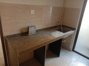 Kitchen in 1.5 BHK Apartment at Sunteck Maxxworld, Naigaon East – for Rent