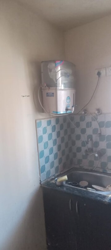 Bathroom in 2 BHK Apartment at Aims Golf City, Sector 75 – for Sale