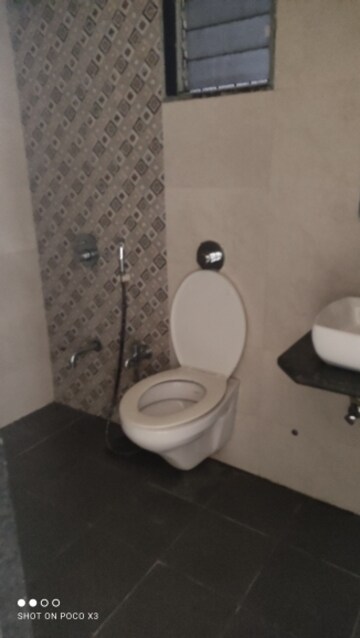 Bathroom in 1 BHK Apartment at Puranik City Reserva, Ghodbunder – for Rent