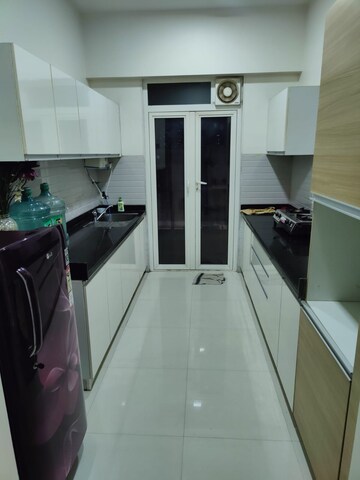 Kitchen in 3 BHK Apartment at Omkar Alta Monte, Malad East – for Rent