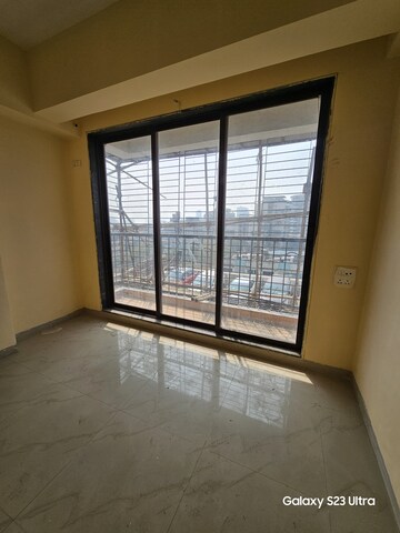 Room in 2 BHK Apartment at Mahavir Nagari Towers CHS, Kalyan West – for Sale
