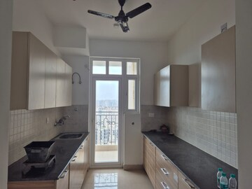 Kitchen in 3 BHK Apartment at Amrapali Golf Homes, Sector 4, Greater Noida – for Rent