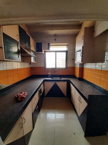 Kitchen in 2 BHK Apartment at Shree Gajanan Maharaj Nagar CHS, Kalyan West – for Rent