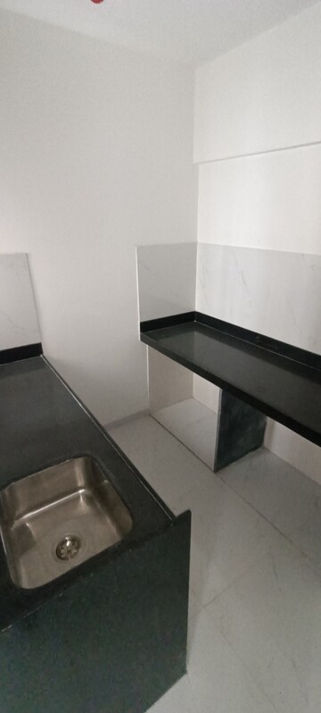 Kitchen in 1 BHK Apartment at Runwal Gardens, Dombivli East – for Rent
