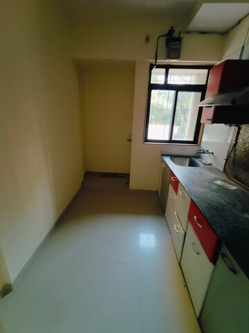 Kitchen in 1 BHK Apartment at Puranik Hometown, Ghodbunder Road – for Rent