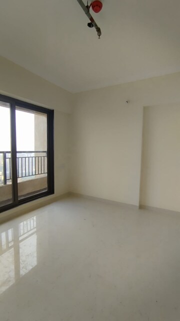Room in 2 BHK Apartment at Raunak City Sector 4, Kalyan West – for Sale