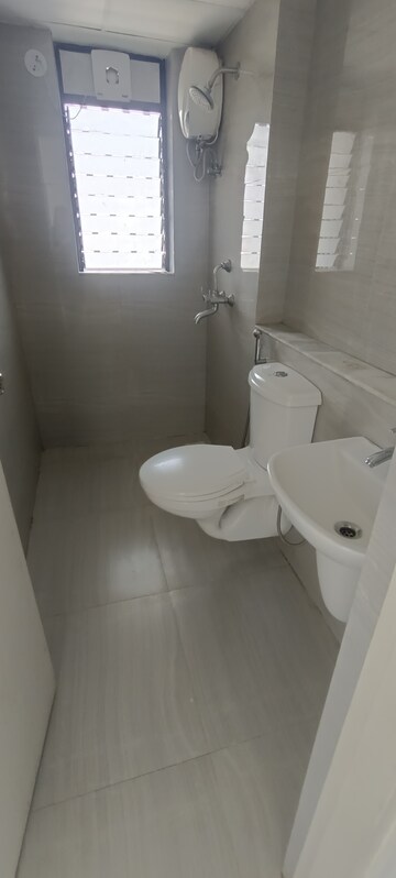 Bathroom in 2 BHK Apartment at Runwal Gardens, Dombivli East – for Rent