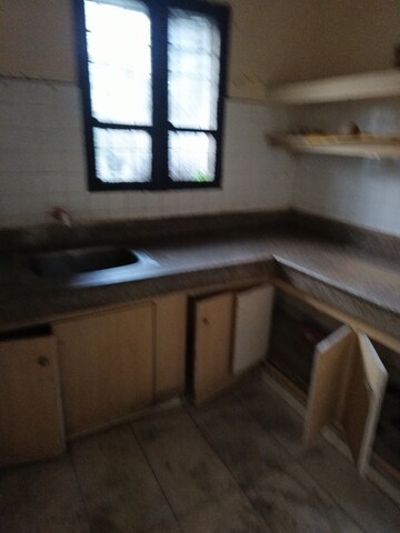 Kitchen in 2 BHK Apartment at Jal Vayu Vihar Noida, Sector 21 – for Sale