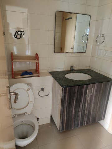 Bathroom in 3 BHK Apartment at Shiv Sai Ozone Park, Sector 86 – for Rent