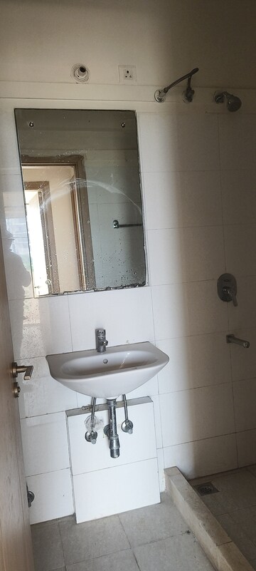 Bathroom in 3.5 BHK Apartment at DLF New Town Heights III, Sector 91 – for Rent