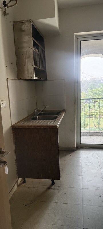 Kitchen in 3.5 BHK Apartment at DLF New Town Heights III, Sector 91 – for Rent