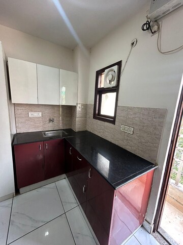 Kitchen in 1 RK Builder Floor at Ansal Sushant Lok I, Sector 43 – for Rent