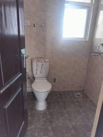 Bathroom in 2 BHK Apartment at Gaur City 2 - 12th Avenue, Sector 16c Greater Noida – for Rent