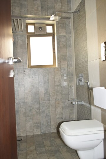 Bathroom in 2 BHK Apartment at Matoshree Pearl, Mahim – for Rent