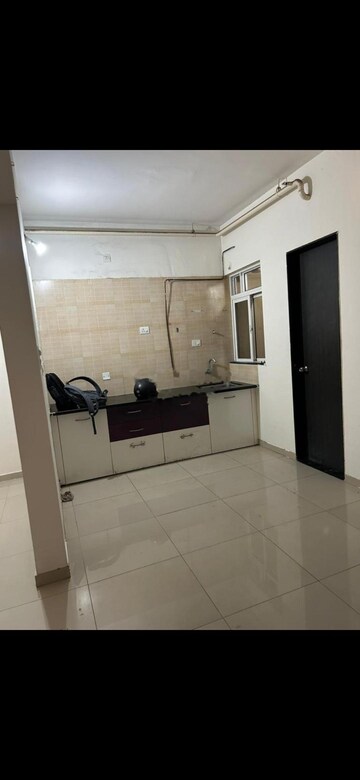 Kitchen in 2 BHK Apartment at Kolte Patil R10, Hinjewadi – for Rent
