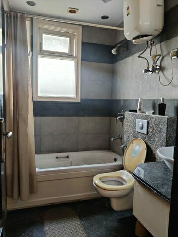 Bathroom in 4 BHK Builder Floor at Vasant Vihar – for Rent