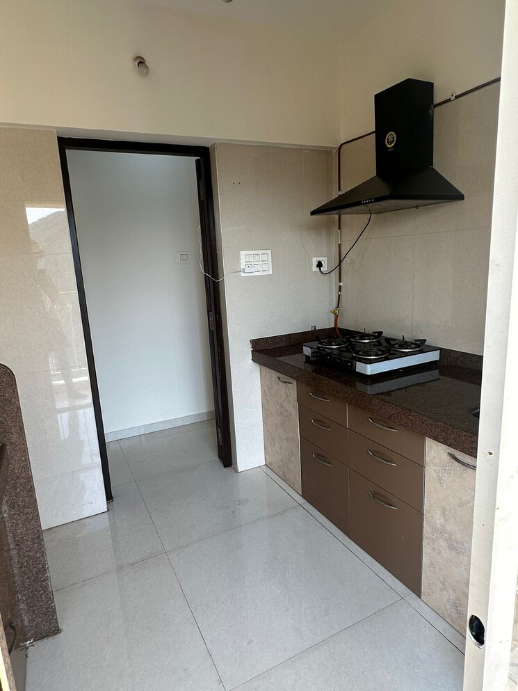 Kitchen, kishor-sukur-enclave-a 2 Bedroom 950 Sq.Ft. Apartment In Ghodbunder Road Thane 8028140