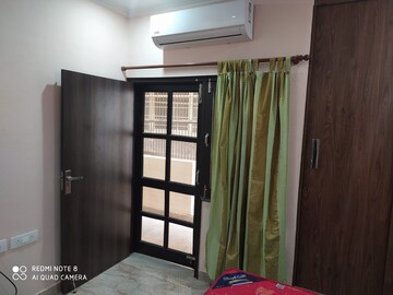 Bedroom in 2 BHK Builder Floor at Ansal Sushant Lok I, Sector 43 – for Rent